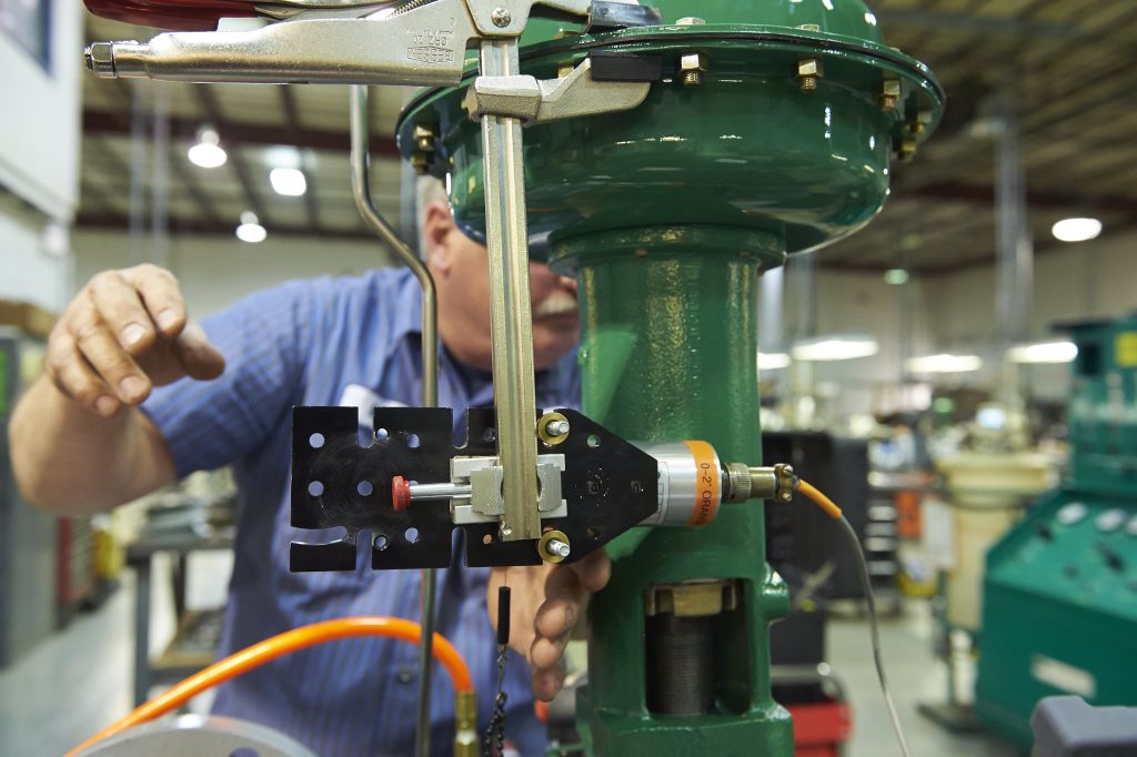 Automation Service engineer working on a machine