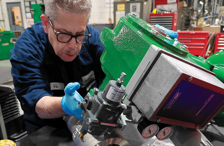 Automation Service technician preparing reclaimed instrumentation for the recycling program